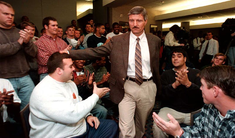 UNC football staff remembers the intensity, tender-heartedness of late head coach Carl Torbush