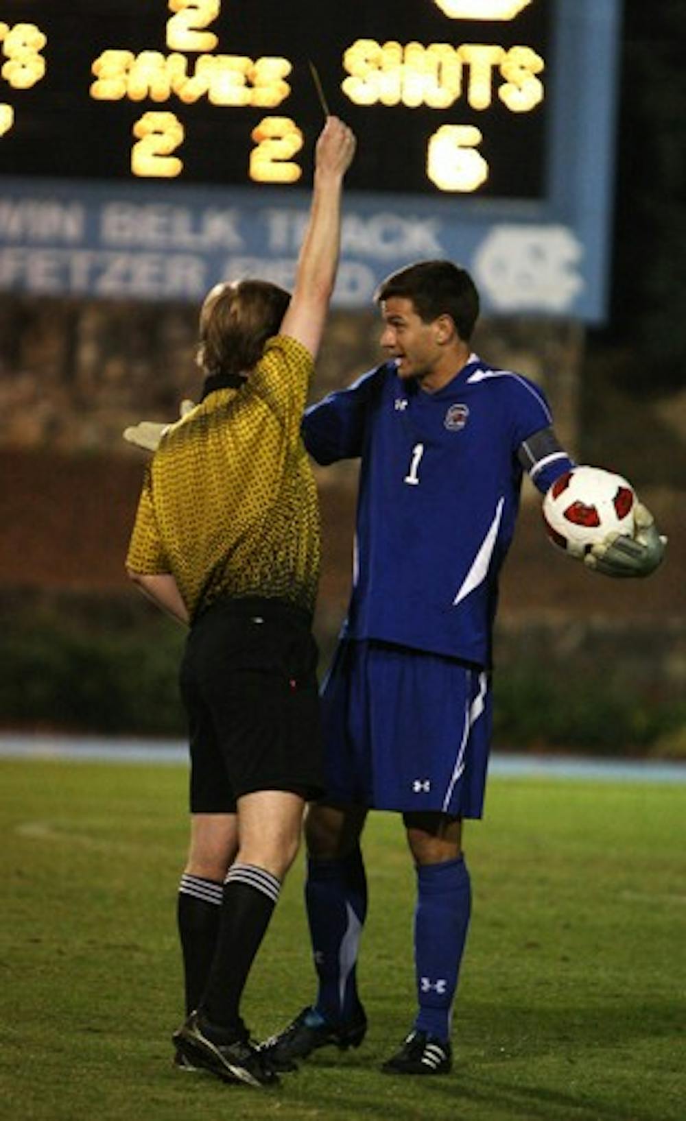 South Carolina goalie Jimmy Maurer argues with the ref after being issued a yellow card in the 55th minute of a physical match.