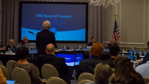 David Routh, the Vice Chancellor of Development, is honored at the UNC Board of Trustees meeting on Nov. 10, 2022.