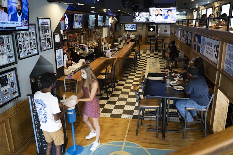 'It's tough': Franklin Street restaurants prepare for uncertain fall sports season