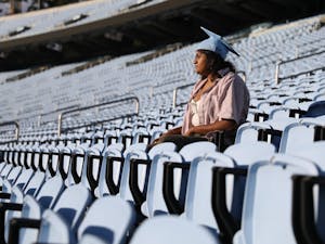 Opinion Editor Rajee Ganesan sits in an empty Kenan Stadium on Thursday, Jan. 6, 2022.