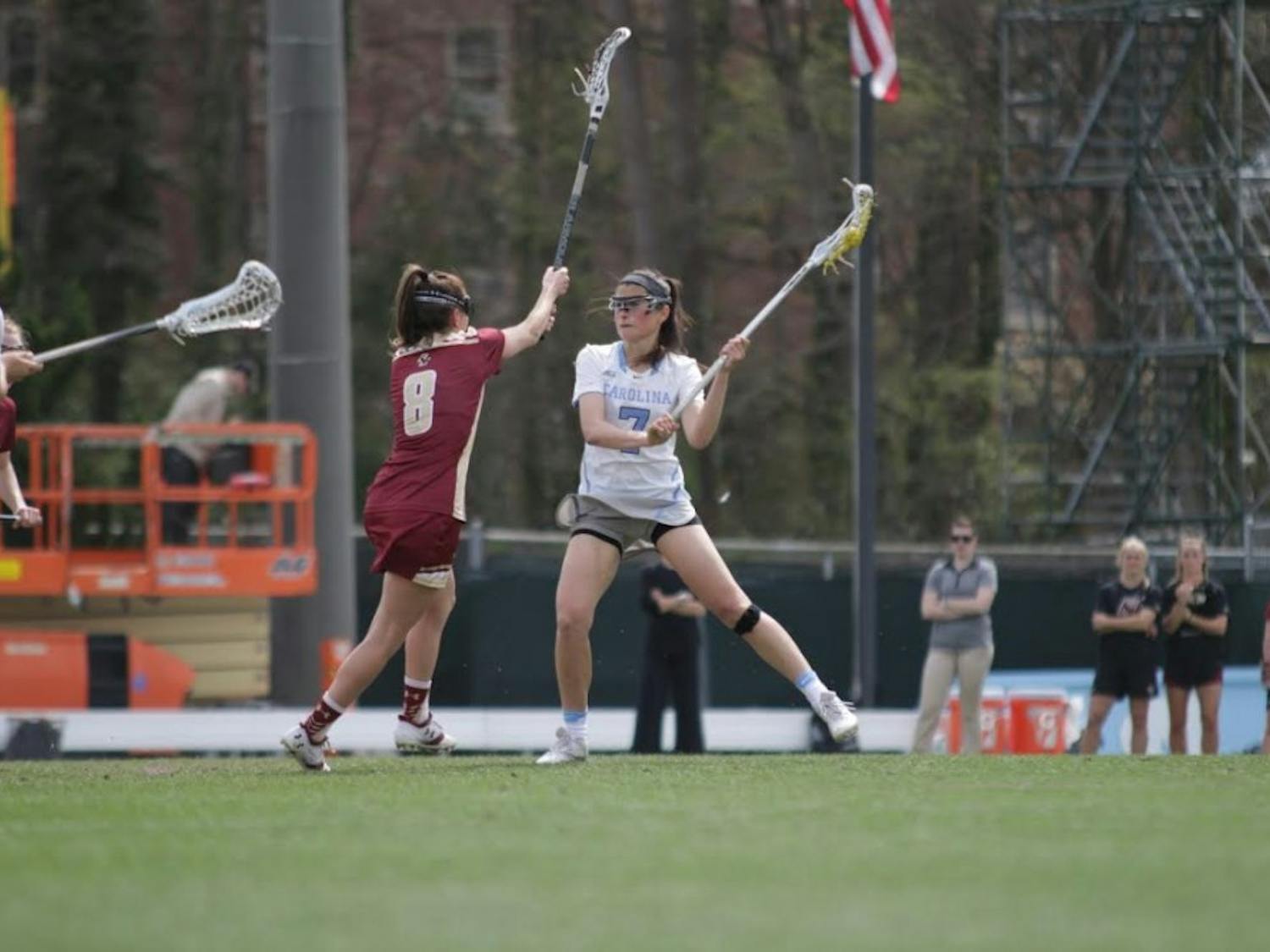 Junior Midfielder Ela Hazar carries the ball up the field in the game against Boston College on Saturday.&nbsp;