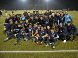 The North Carolina men's soccer team celebrates after defeating Fordham, 2-1, and advancing to its second consecutive college cup on Dec. 2 at WakeMed Soccer Park in Cary.