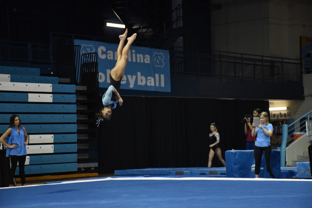 UNC gymnastics wins first meet of season, 195.300-194.375, over Temple ...