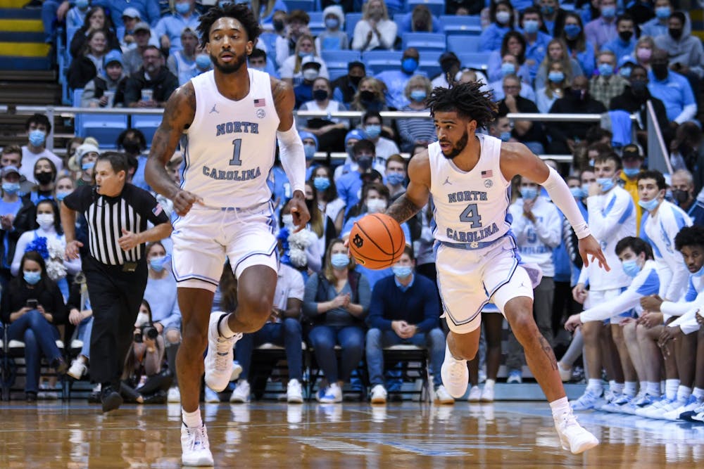 Sophomore guard RJ Davis (4) runs with the ball in the game against Appalachian State in the Dean E. Smith Center on Dec 21, 2021. UNC won 70-50.