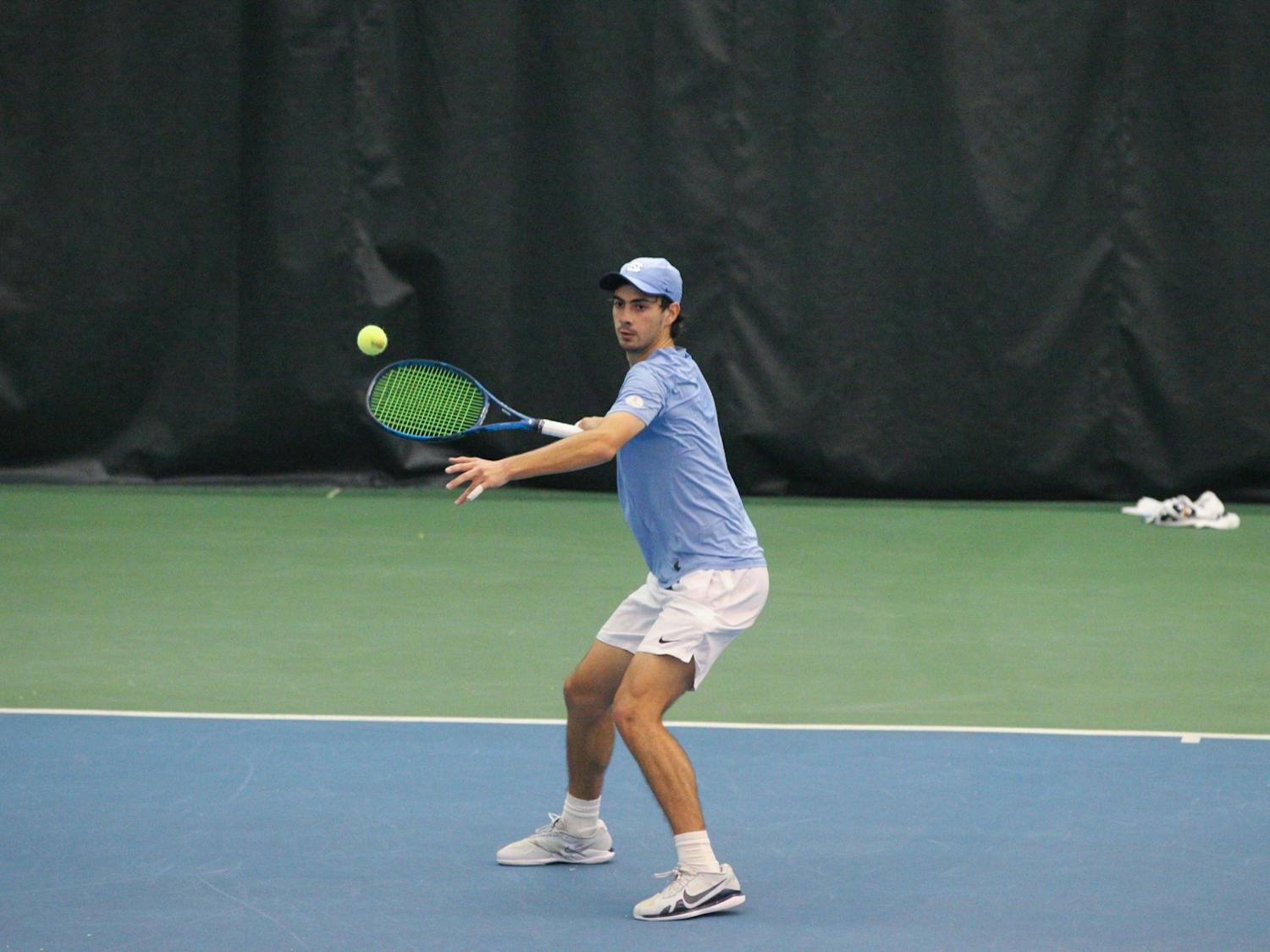 UNC sophomore Logan Zapp returns a volley during the Tar Heels’ 4-2 victory over South Carolina in the Cone-Kenfield Tennis Center on Feb. 13, 2022.
