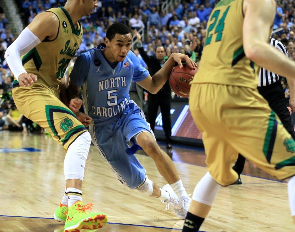 <p>Marcus Paige (5) led the Tar Heels in points, scoring 24 total, Saturday night in the ACC championship game against Notre Dame. The Notre Dame leading scorer, Jerian Grant (22), also scored 24 points. </p>
