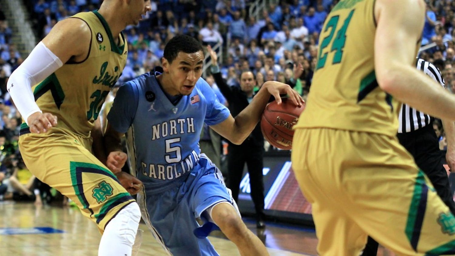 Marcus Paige (5) led the Tar Heels in points, scoring 24 total, Saturday night in the ACC championship game against Notre Dame. The Notre Dame leading scorer, Jerian Grant (22), also scored 24 points. 