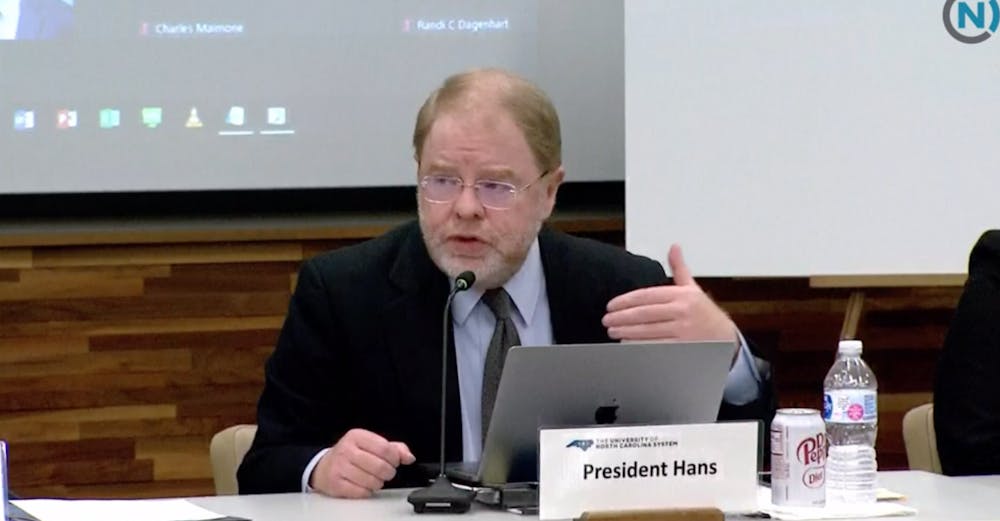 UNC System President Peter Hans speaks to the Board of Governors during a full board meeting on Thursday, Feb. 24, 2022.