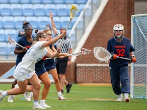 UNC senior defender Emma Trenchard (23) prepares to shoot the ball at the game against Virginia on Sunday Apr. 18, 2021 at the Dorrance Field. UNC won 15-4.