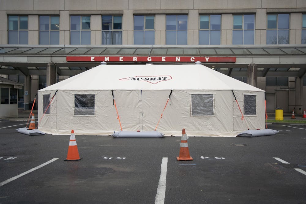A tent stands outside the emergency wing of the UNC Medical Center on Monday, March 23, 2020. The tent was set up to keep coronavirus patients separated from other patients and hospital staff members.