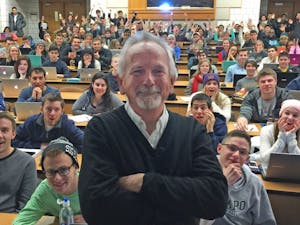Perry Samson, a professor of atmospheric sciences at the University of Michigan and the founder of LectureTools, now known as Echo360, stands in front of one of his lecture classes. Photo courtesy of Perry Samson.