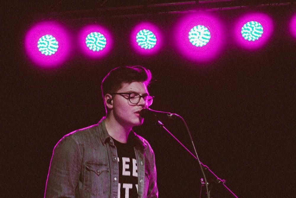 Kevin Garrett playing piano during his sold out show at Cat's Cradle.