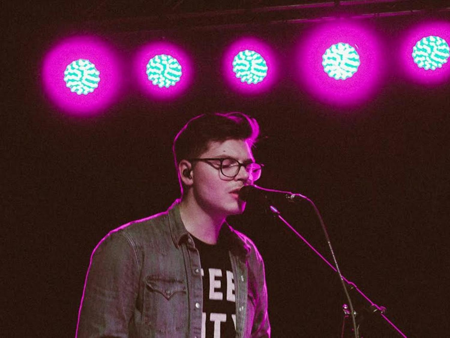Kevin Garrett playing piano during his sold out show at Cat's Cradle.