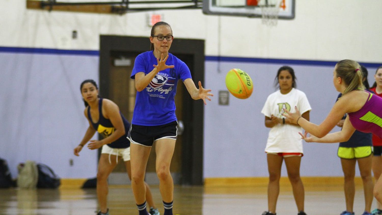 Alicia Wood, a senior environmental science major, prepares to catch the ball during a practice exercise.