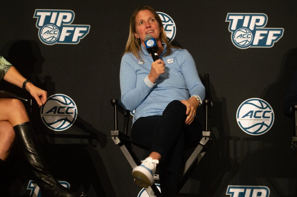<p>Women's basketball head coach Courtney Banghart speaks at the ACC Tipoff in Charlotte, NC, on Oct. 13.</p>