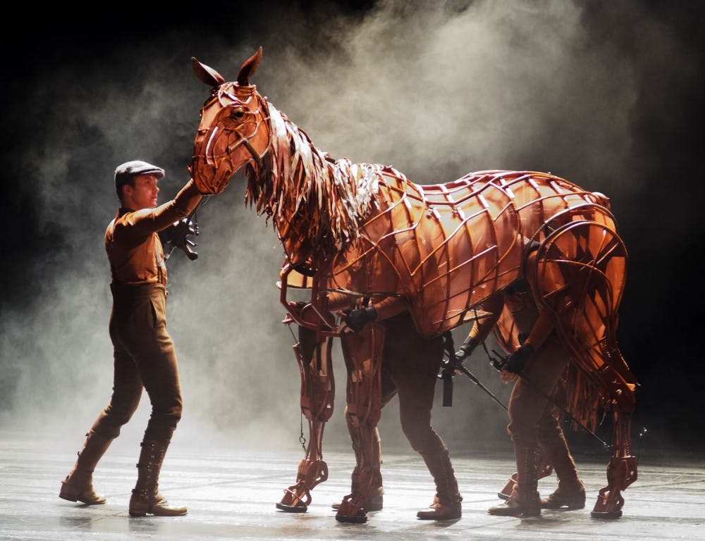 Cast members perform during the opening night of the musical "War Horse" at the Durham Performing Arts Center in Downtown Durham, NC on Tuesday, October 2nd 2012. The National Theatre of Great Britain produces the show that will run until October 7th.