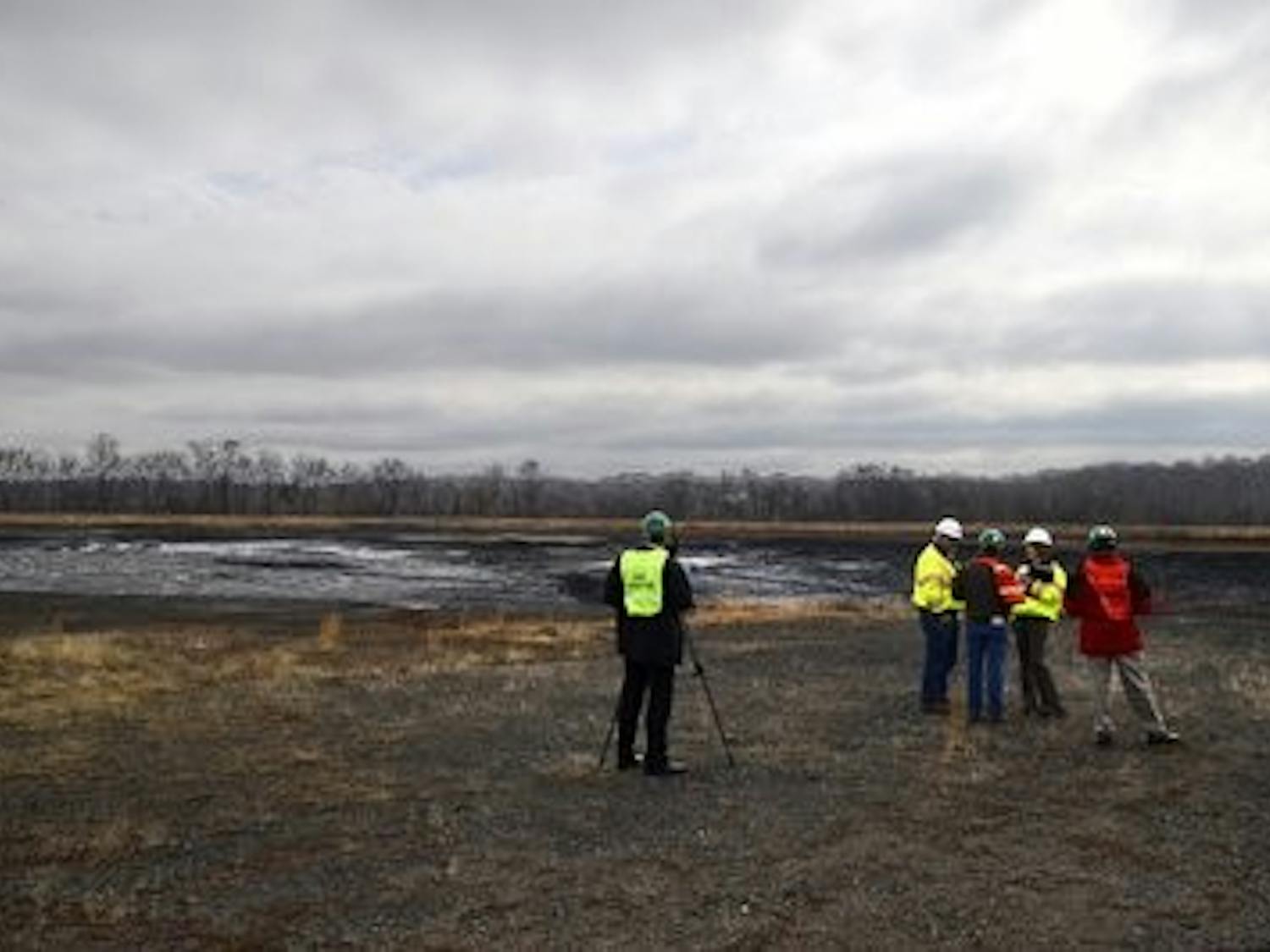 Duke officials took media members on a brief tour of the coal ash pond where an underground storm water pipe developed a break allowing water containing coal ash leaked into the Dan River at Eden, NC. (John D. Simmons/Charlotte Observer/MCT)