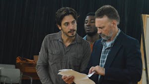 Ariel Shafir, Tristan Parks, and Jeffrey Cornell discuss important documents during rehearsal for Playmakers rendition of The Crucible in the Center of Dramatic Art on Wednesday, Oct. 5th.  The Crucible debuts on Oct. 19th, 2016. 
