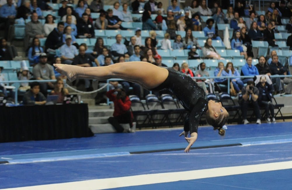 <p>Senior Madison Hargrave competes on the floor in a meet against New Hampshire University in Carmichael Arena on Friday, Feb. 23, 2019.</p>