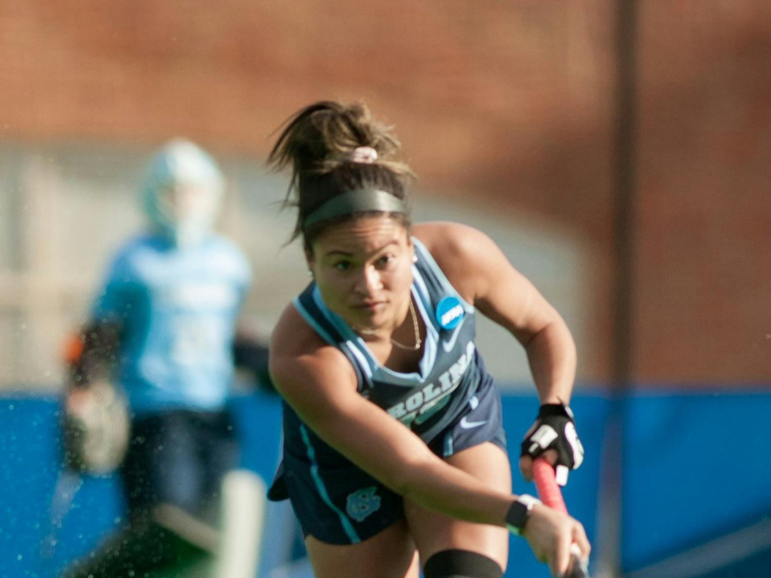 Junior back Courtnie Williamson (25) passes the ball during the NCAA Championship Game against Princeton University at Kentner Stadium on Sunday, Nov. 24, 2019. UNC won 6-1, marking their 8th national championship.
