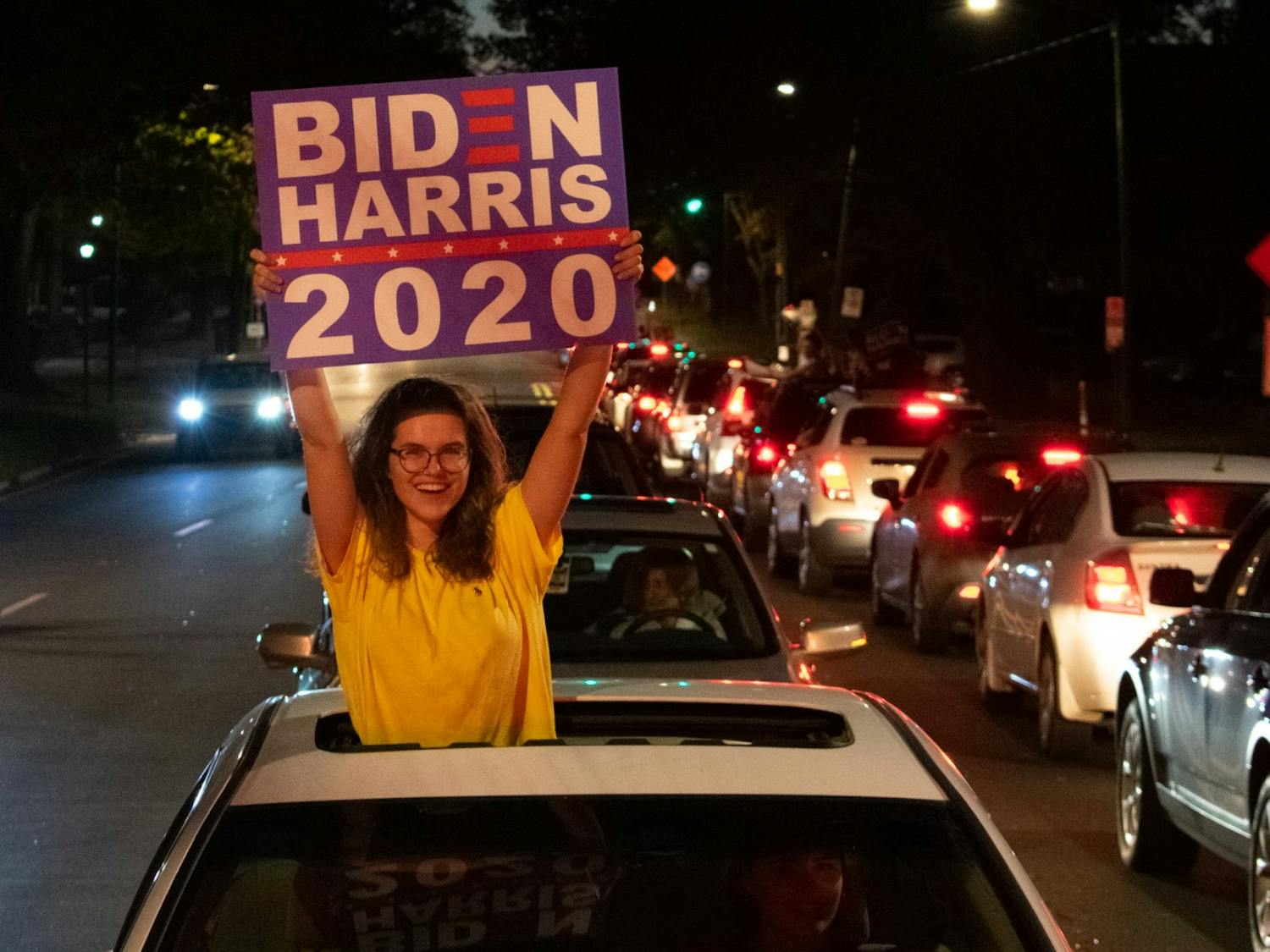 People in Chapel Hill celebrate former Vice President Joe Biden's projected win of the 2020 election on Saturday, Nov. 7, 2020. 