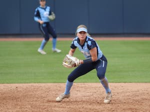 Shortstop Alex Brown (5) looks to throw the ball to first base in a home game against Appalachian State on Wednesday, March 30, 2022. UNC won 8-4.