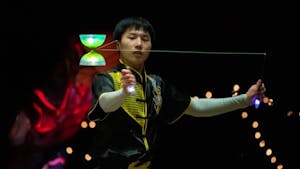 A stage performer yo-yos for the crowd at the NC Chinese Lantern Festival on Saturday, Jan. 8, 2022, at the Koka Booth Amphitheatre in Raleigh, NC. 