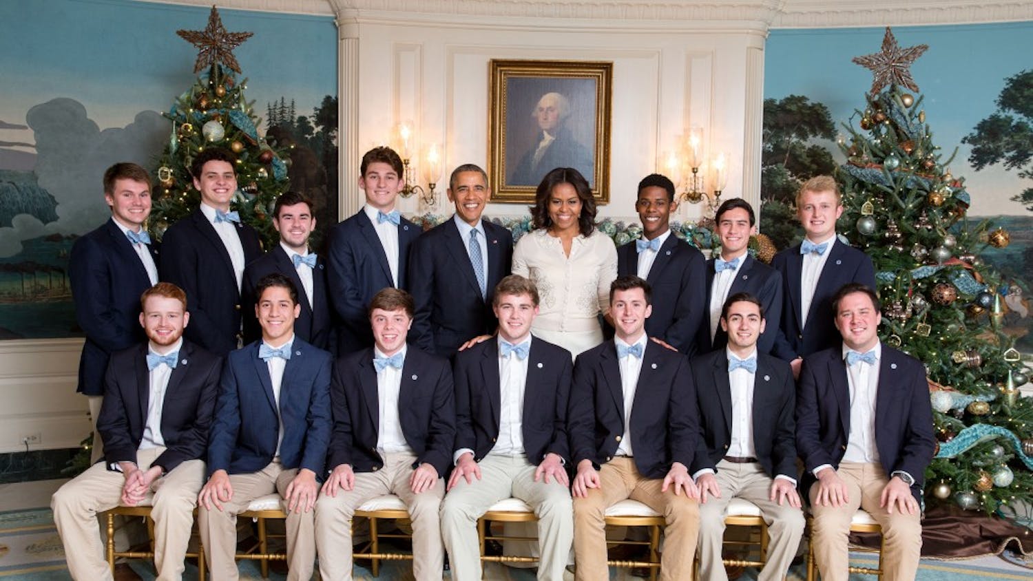 President Barack Obama and First Lady Michelle Obama join the UNC (University of North Carolina) Clef Hangers for a group photo and listen to them perform in the Diplomatic Reception Room prior to Christmas holiday EOP Reception #1 at the White House, Dec. 15, 2015. (Official White House Photo by Chuck Kennedy)This photograph is provided by THE WHITE HOUSE as a courtesy and may be printed by the subject(s) in the photograph for personal use only. The photograph may not be manipulated in any way and may not otherwise be reproduced, disseminated or broadcast, without the written permission of the White House Photo Office. This photograph may not be used in any commercial or political materials, advertisements, emails, products, promotions that in any way suggests approval or endorsement of the President, the First Family, or the White House.