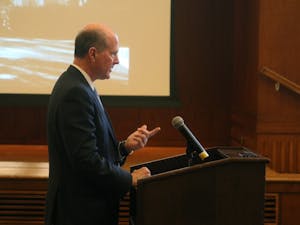 Provost Jim Dean addresses the Board of Trustees regarding the James B. Hunt Institute on Wednesday.