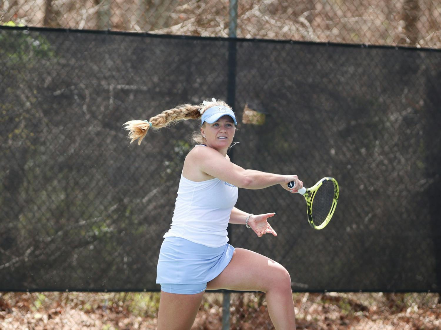 Senior Alle Sanford goes to return a volley from her Boston College opponent during her singles match. UNC won 6-1 at home on Sunday, March 20, 2022.
