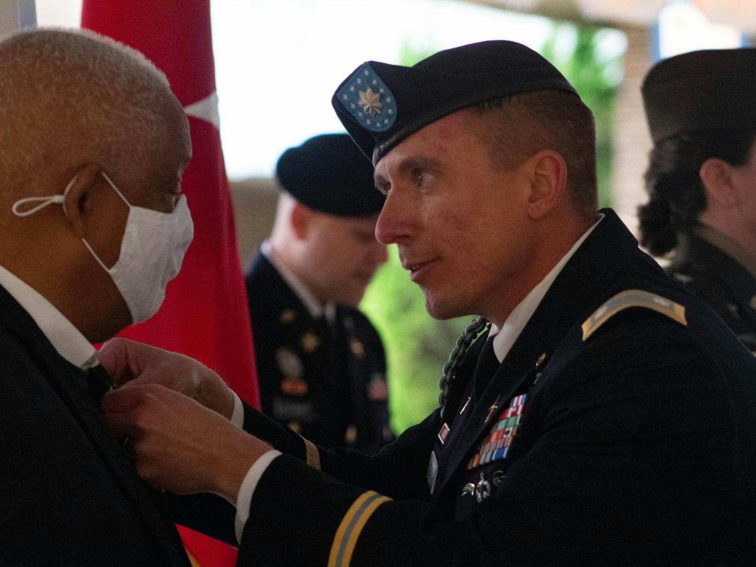 U.S. army veteran John Spencer is awarded the Combat Infantryman badge by Lieutenant Colonel Dan Hurd on Nov. 4, 51 years after he served in the Vietnam War.