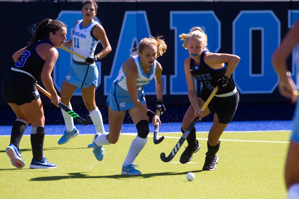 UNC field hockey players fight Duke players for the ball at the game on Sunday, Oct. 18, 2020. UNC won 5-4 in overtime.