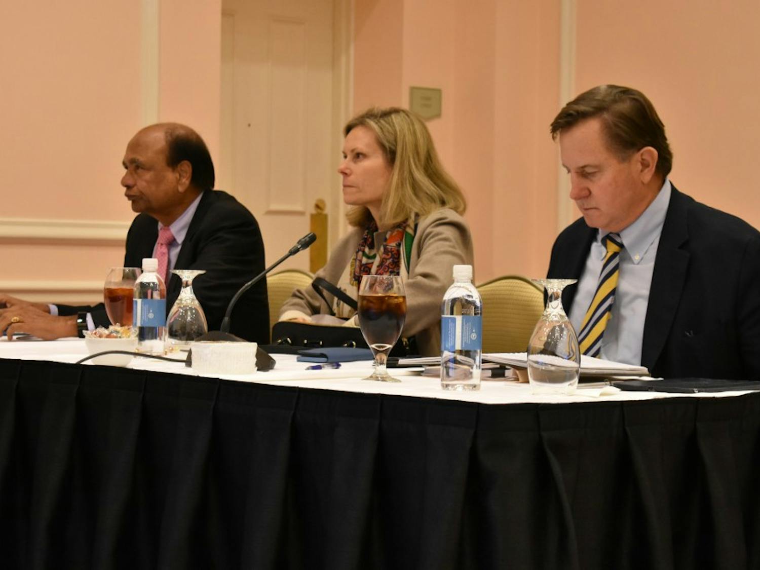 Board of Trustees members (left to right) Hari H.Nath, Kelly Matthews Hopkins and Jefferson W. Brown listen to a presentation during a University Affairs committee meeting in the Carolina Inn on Wednesday, Nov. 14, 2018. 