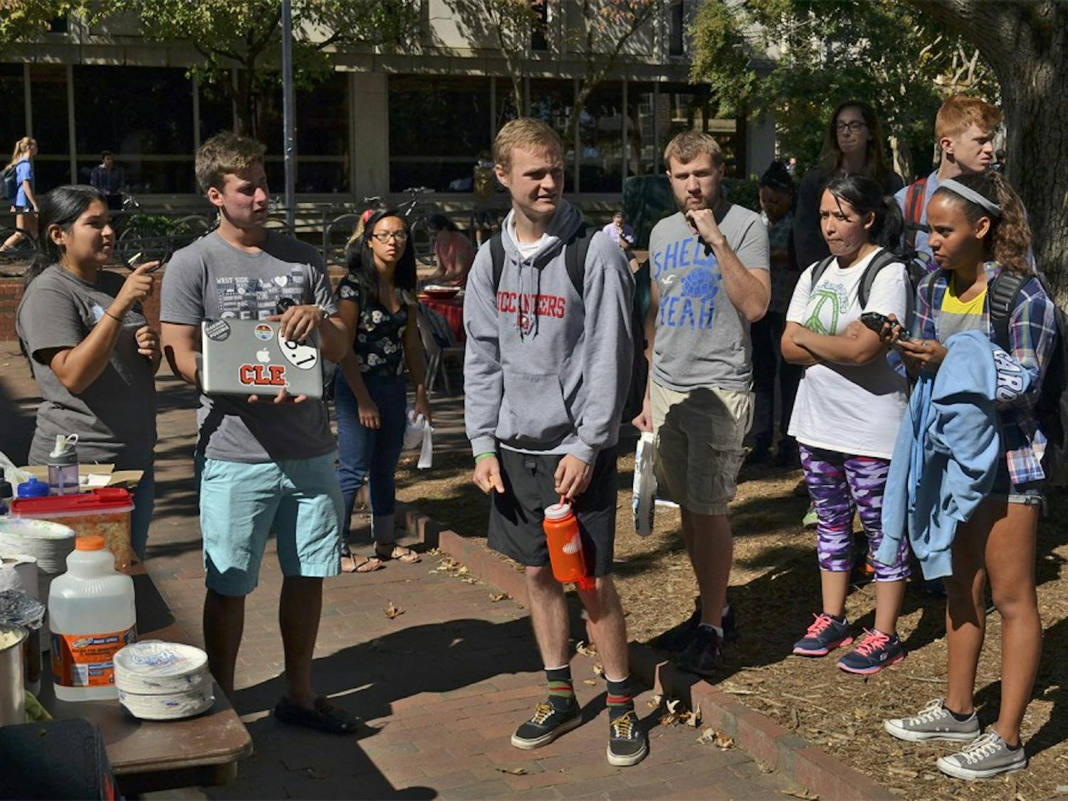 Students wait in line to try free pupusas from local food company "So Good Pupusas", kicking off Hispanic Heritage Month.