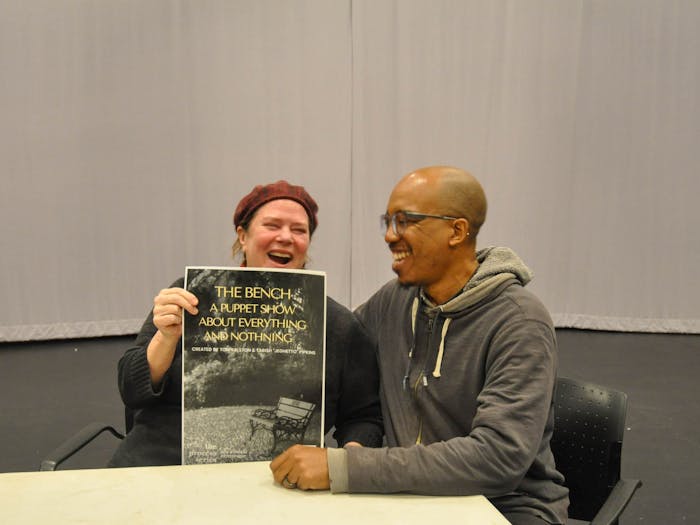 Tori Ralston and Tarish "Jaghetto" Pipkins hold up a flyer for "The Bench" on Tuesday, Feb. 21, 2023. When asked what they're most looking forward to about the show, both said, "We're looking forward to having a rehearsal, a show, and a conversation."