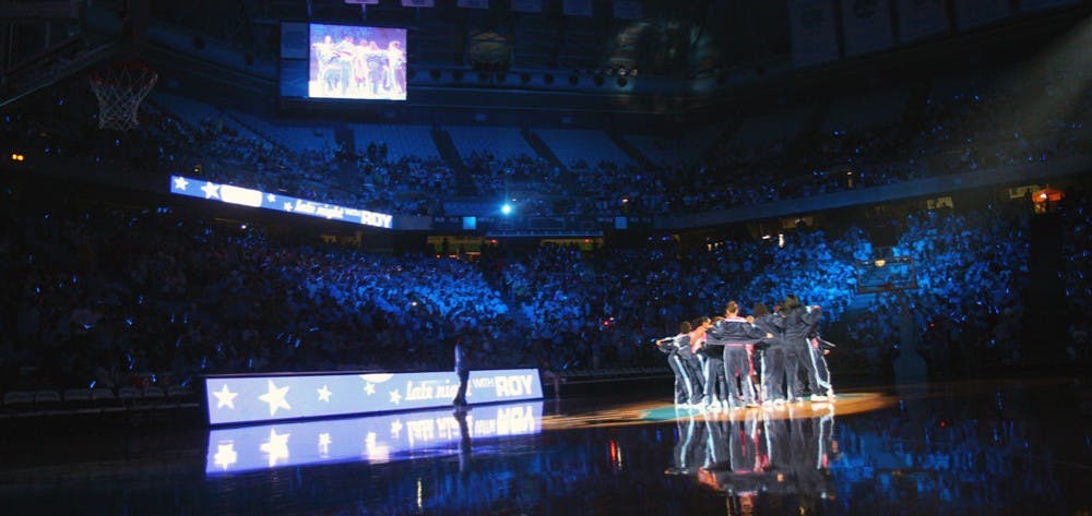 	The UNC women’s basketball team unveils its pink uniforms after its introduction at Late Night with Roy.