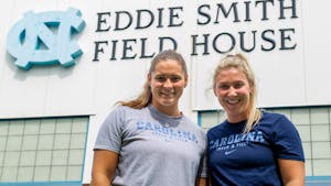 UNC senior thrower Jill Shippee (left) and UNC senior javelin thrower Madison Wiltrout (right) pose for a portrait on Aug. 18, 2020.