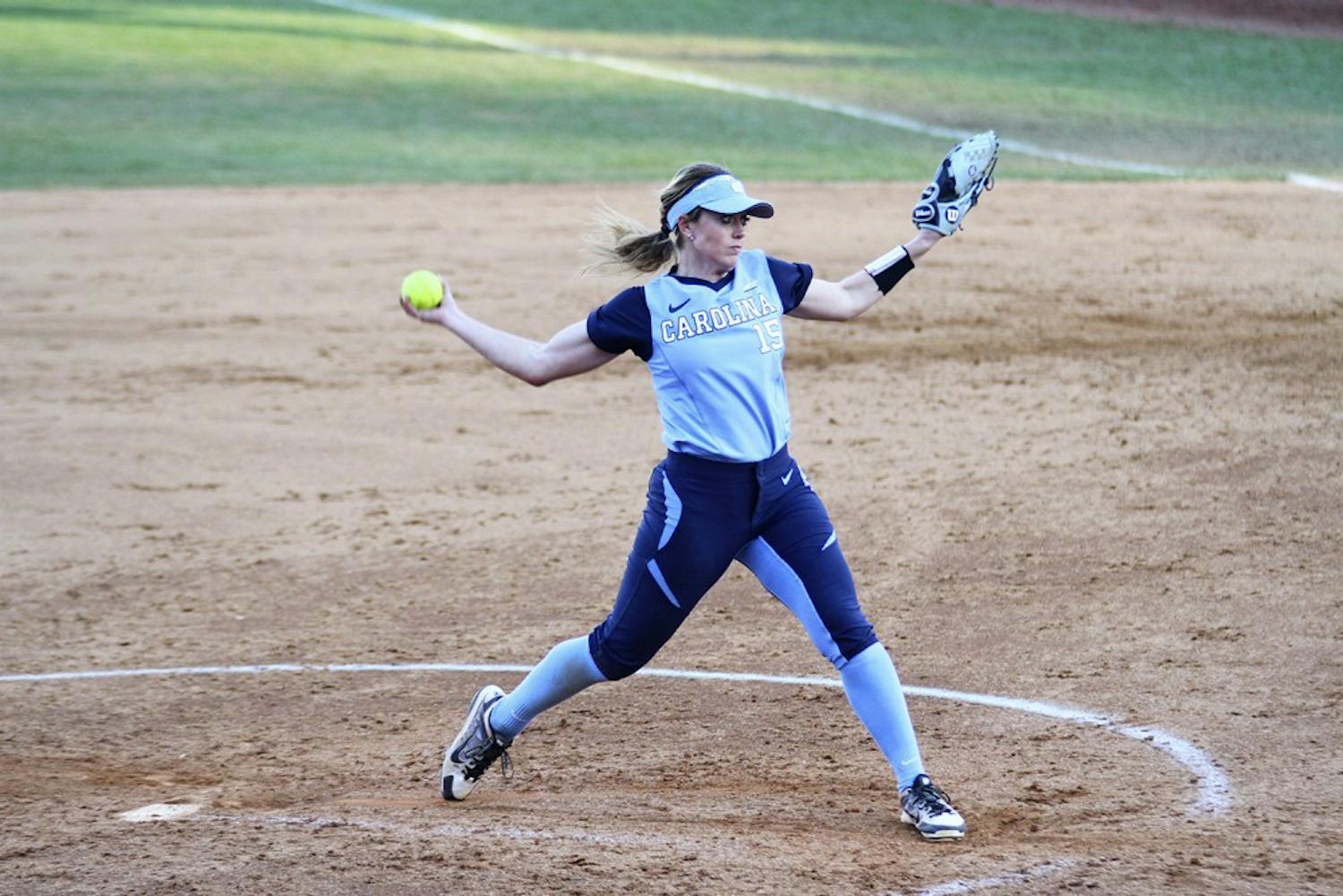 Junior Kendra Lynch (15) pitches the ball in the game against Georgetown February 28.