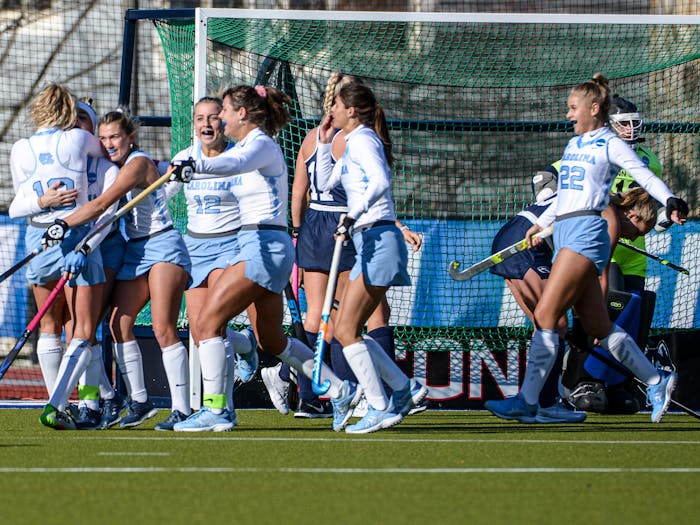 UNC field hockey team celebrates their National Chamiponship victory against No. 3 Northwestern on Sunday, Nov. 20, 2022, at George J. Sherman Sports Complex in Storrs, Conn. UNC won 2-1.&nbsp;