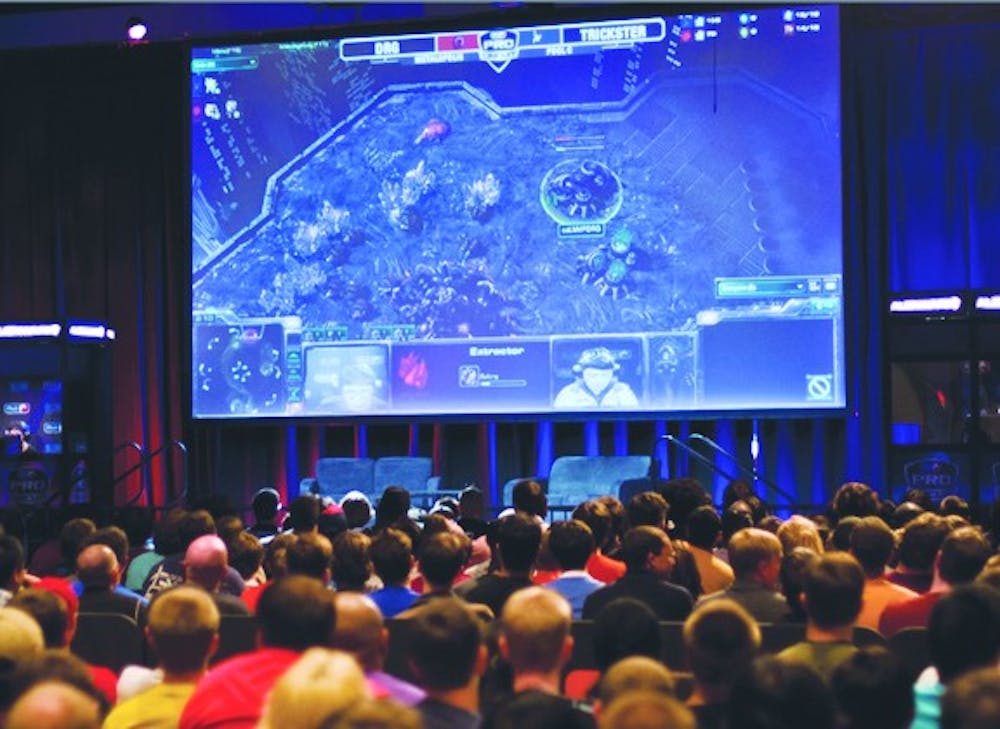 	The crowd watches in awe as two of the top Korean players , DongRaeGu and Trickster, compete on stage at MLG Raleigh 2011.