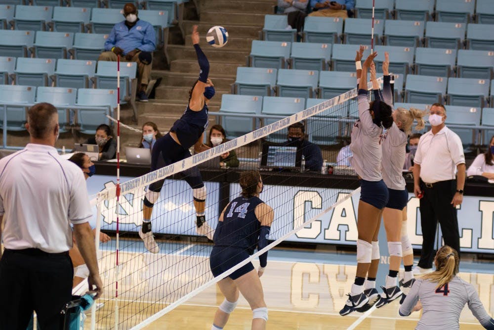 UNC sophomore Carly Peck (OH/RS, 13) strikes during a set against Virginia on Sunday, Nov. 1, 2020. UNC finished their season that night with a 3-1 win.