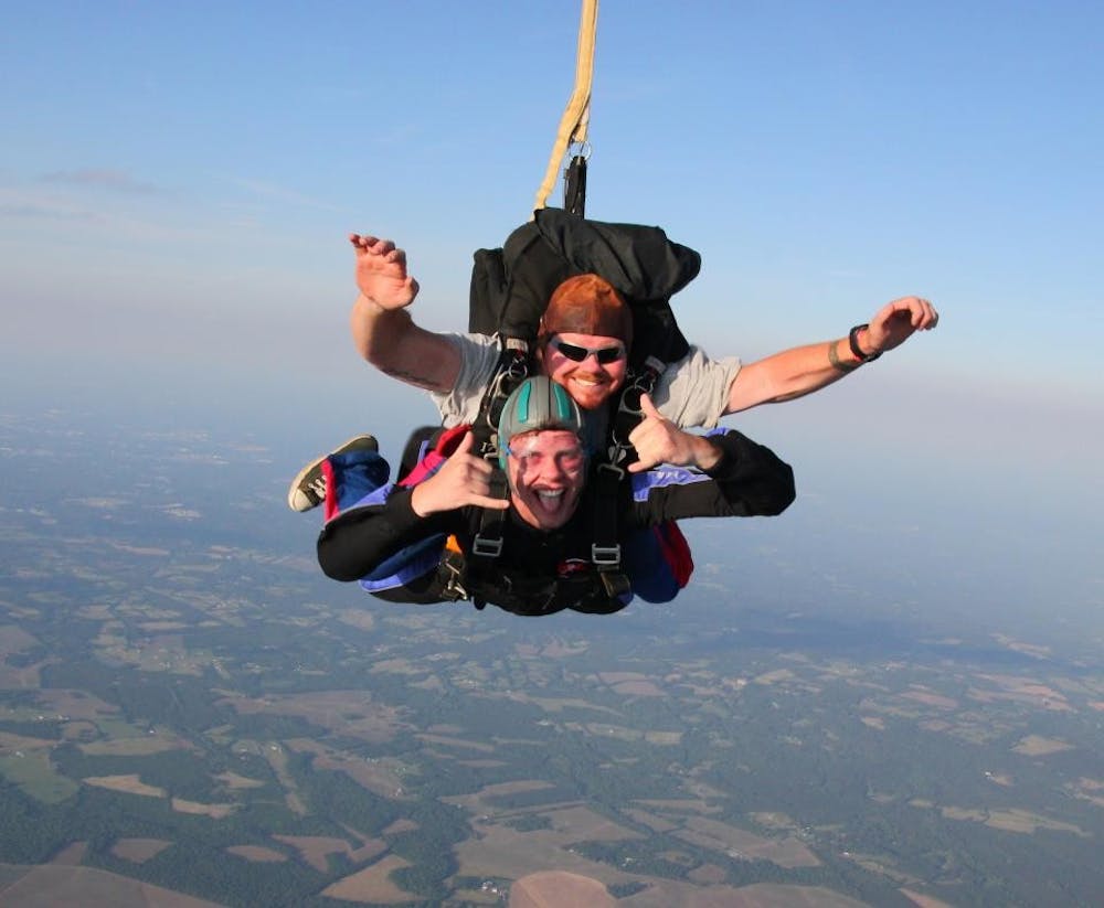 	Sophomore Drew Nations (bottom), the founder of the new UNC Skydiving Club, on his first jump.

	Courtesy of Drew Nations