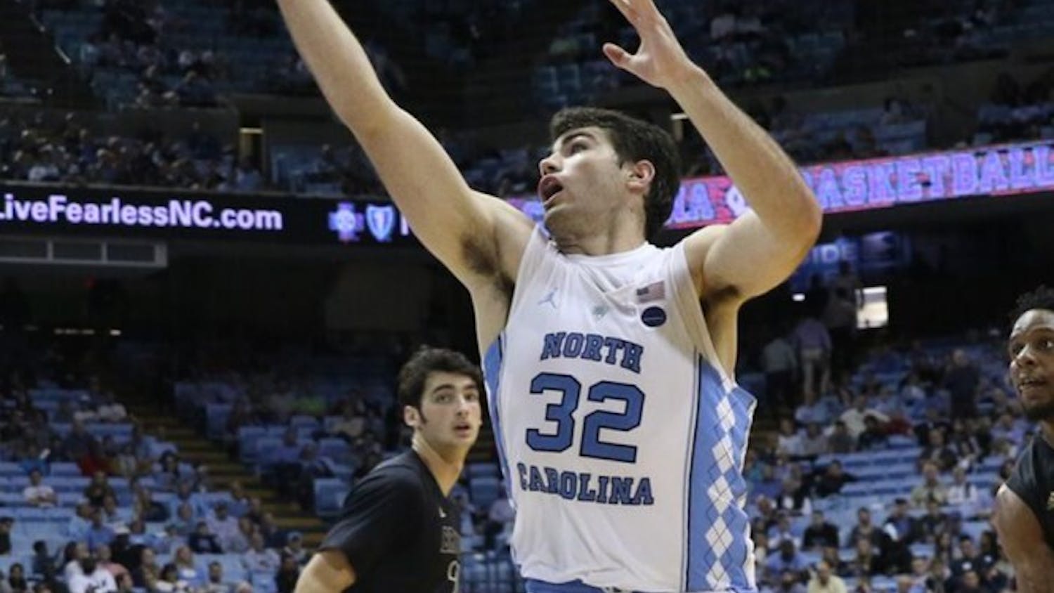 UNC forward Luke Maye (32) catches a pass during the basketball team's game against UNC-Pembrook on Friday.