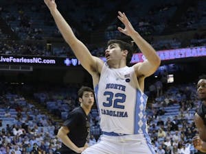 UNC forward Luke Maye (32) catches a pass during the basketball team's game against UNC-Pembrook on Friday.