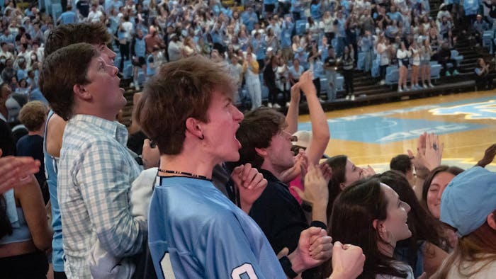A student cheers during the NCAA men's basketball championship game against Kansas in the Dean E. Smith Center on Monday, April 4, 2022.&nbsp;