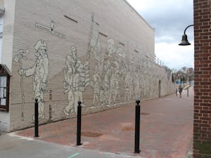 Porthole Alley contains the "Parade of Humanity" mural, painted in 1997 by Chapel Hill native Michael Brown.&nbsp;
