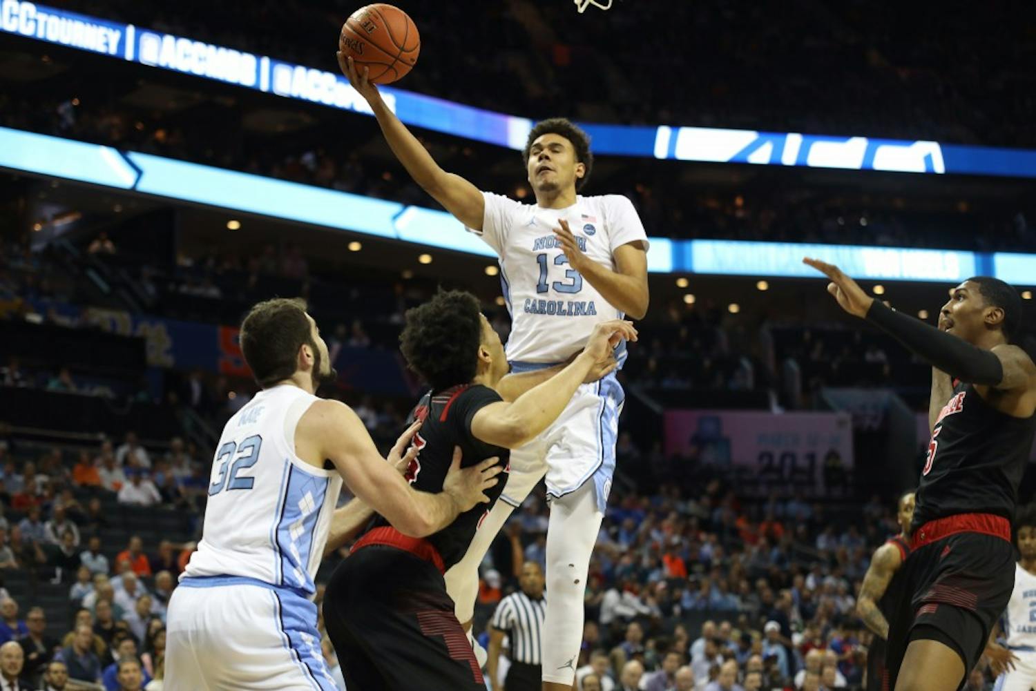 Graduate guard Cameron Johnson attempts a layup in the first half against Louisville in the ACC Tournament quarterfinals at the Spectrum Center in Charlotte.
