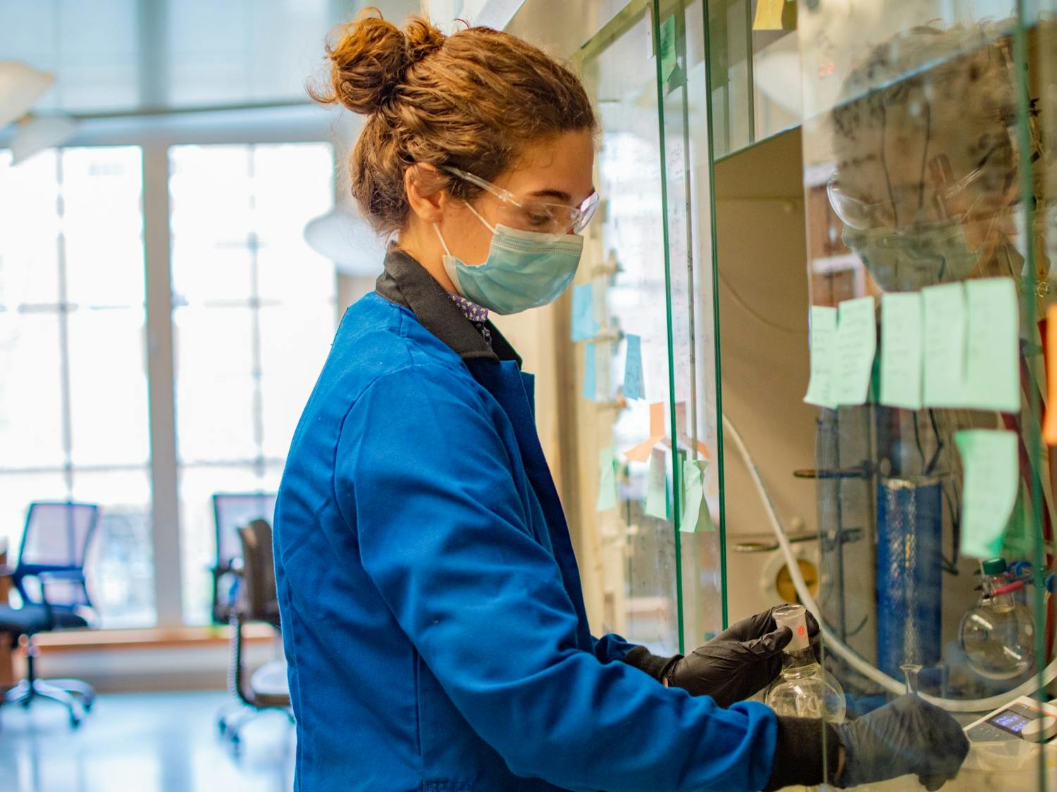 Eliza Neidhart, a second year student in the chemistry graduate program, cleans her tools in the Leibfarth lab where she does polymer research on Feb. 22, 2022.
