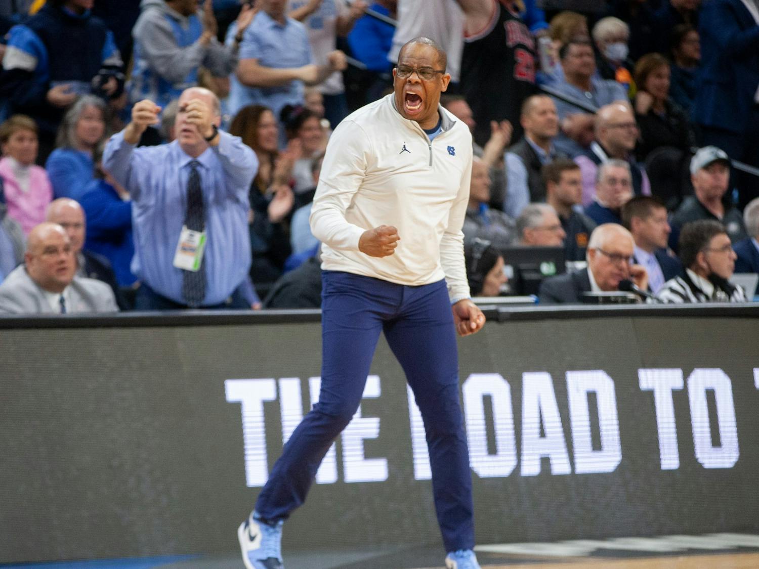Head coach Hubert Davis yells to his players at the NCAA Sweet 16 game against UCLA at the Wells Fargo Center in Philadelphia, PA on March 25, 2022. UNC won 73-66 and will be advancing to the Elite 8.